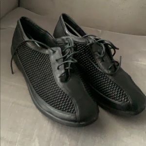 Black lace up comfortable shoes.
